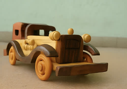 A handicraft wooden toy car