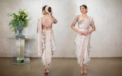 A model wearing a contemporary Nauvari saree with a modern twist—paired with a designer blouse and styled for a fashion-forward bridal look.